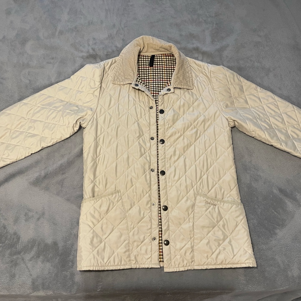 Look as amazing as the Queen of England did in this Barbour Eskdale Jacket!